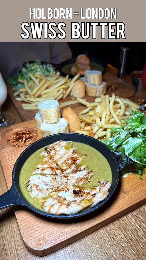 The video showcases Swiss Butter, a steakhouse in Holborn, London. It highlights their signature Swiss butter sauce (made with 33 herbs and spices) served with various protein options like salmon and chicken, along with fries and baguettes. The presentation focuses on the creamy sauce and grilled proteins. Mocktails are also featured. The video emphasizes the rich, flavorful dish, but the influencer notes the sauce's buttery richness may be excessive for some.