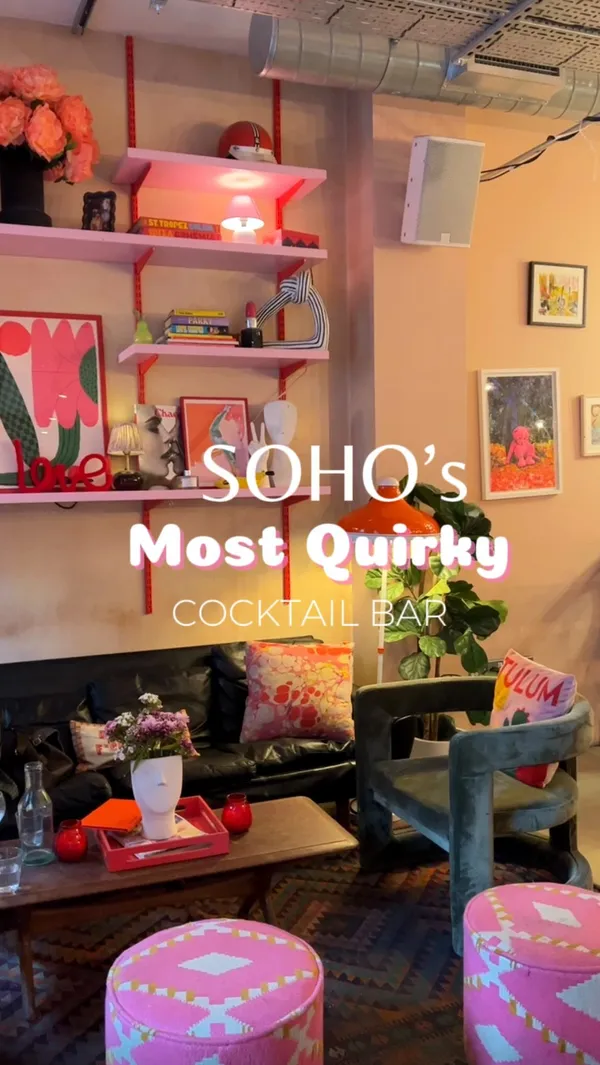 The video showcases The Little Scarlet Door, a quirky cocktail bar in Soho, London.  It highlights the bar's interior design, which features vibrant colors, eclectic decor, and a playful atmosphere. The video shows various cocktails (primarily a pink-colored one served in a punch bowl),  appetizers (chicken wings and smoked salmon with blinis), and the bar's overall ambiance. The influencer interacts with the setting, using a vintage rotary phone as a prop. The video focuses on the bar's unique aesthetic and the fun experience it offers.