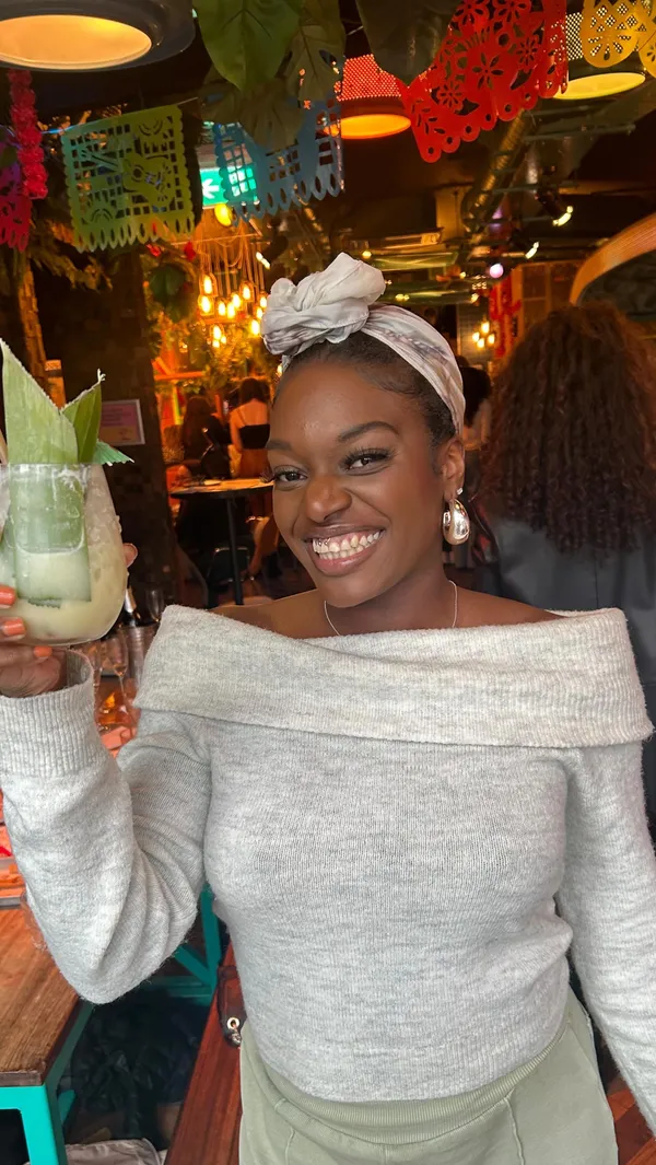 The video showcases a bottomless brunch event at Barrio Brixton, a bar in Brixton, London. It features various food items, including mini quesadillas with different toppings and a selection of chips and dips.  The drinks include unlimited Prosecco and large cocktail jugs. The presentation is vibrant and colorful, reflecting the energetic atmosphere of the bar.  The video highlights the fun, lively atmosphere with dancing and bingo. No specific dietary information is provided.