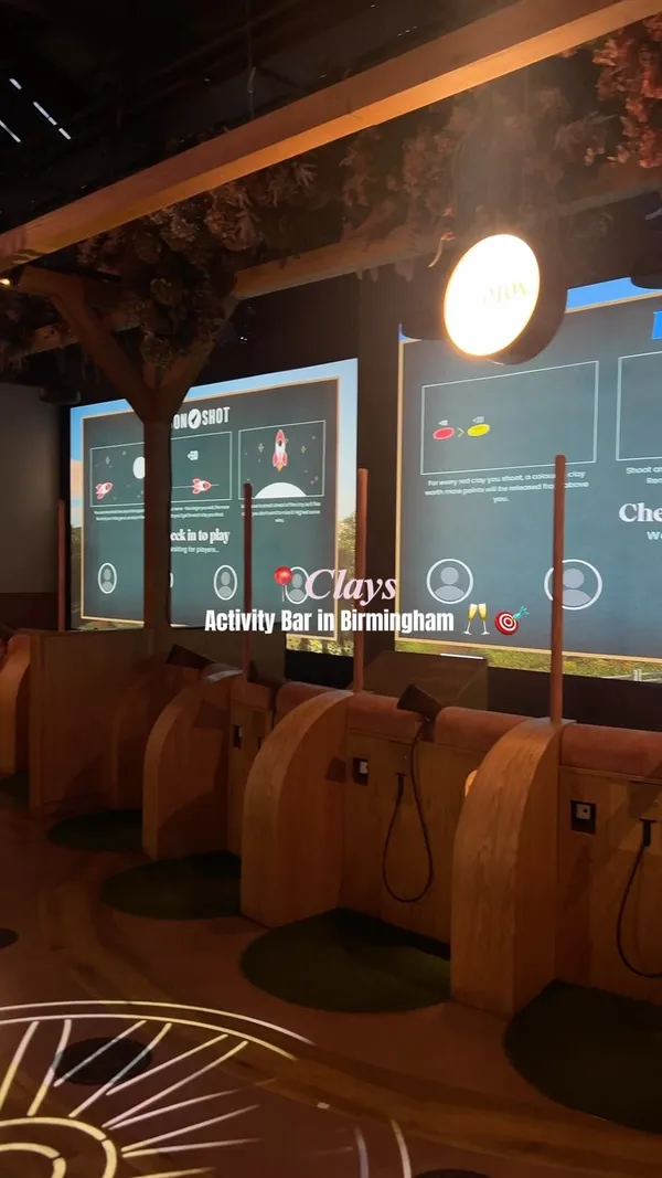 A short, energetic reel showcasing a visit to Clays, an activity bar in Birmingham, highlighting the digital clay pigeon shooting experience and the bar atmosphere.
