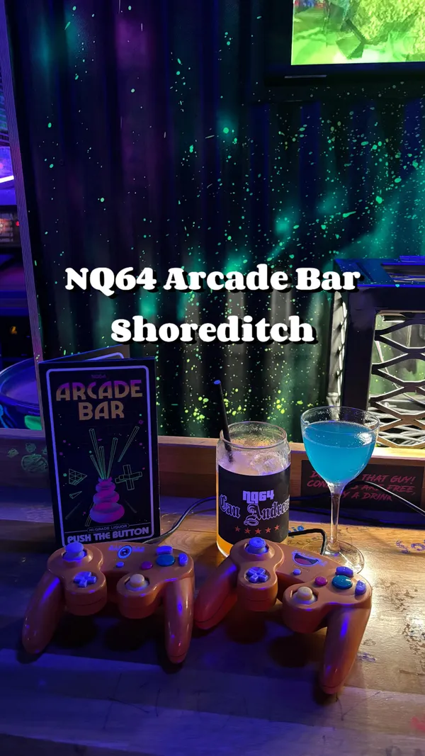 The video showcases NQ64, a neon-lit arcade bar in Shoreditch, London. It features various retro arcade games, including Pac-Man, Guitar Hero, Dance Dance Revolution, and Time Crisis.  The bar also offers a menu of themed cocktails, including the Kirby, Royal Crumble, Disco Stu Daiquiri, and Can Andreas.  Food is available from Nanny Bill's, offering burgers and croquettes. The video highlights the unique atmosphere and diverse entertainment options, emphasizing the overall fun and social experience.