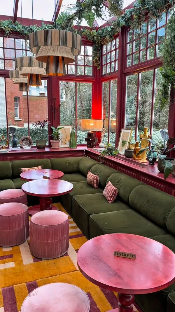 A short montage showcasing the interior and food at Eve Kensington. The video features shots of the conservatory-style dining area, pizzas, fries, salad, and cocktails, set to music.