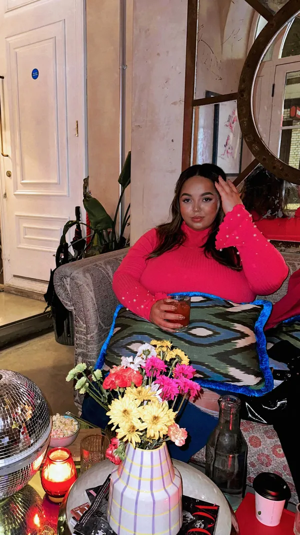 This video showcases The Little Scarlet Door, a bar and restaurant in Soho, London.  The video shows the interior of the venue across two floors, highlighting its unique design and decor. Cocktails are featured prominently, including one served in a disco ball. The video also briefly shows the basement area, described as a party area with a DJ on Wednesdays to Saturdays. The video emphasizes the venue's unique atmosphere and quirky design elements.