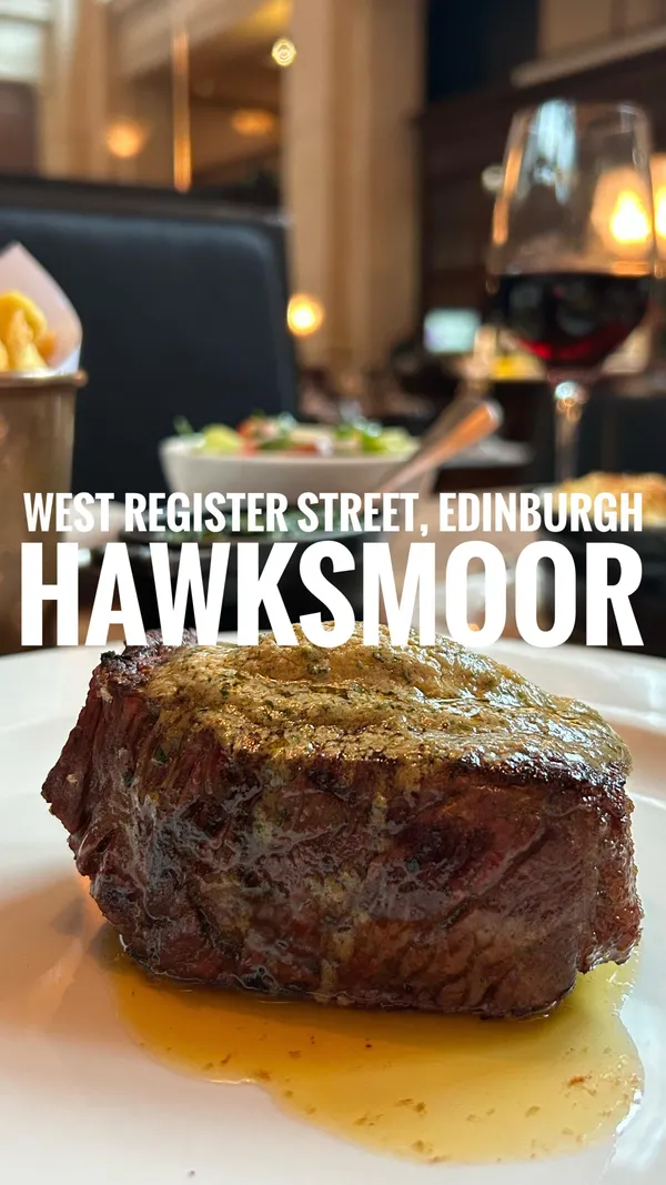 The video showcases a meal at Hawksmoor Edinburgh, a high-end steak restaurant.  It features various dishes, including scallops, crab on toast, steak with sides (fries, spinach, salad, mac & cheese), and a chocolate dessert. The restaurant's interior is also highlighted, showing the bar and dining areas.  The presentation of food is elegant and focuses on the quality of the ingredients.
