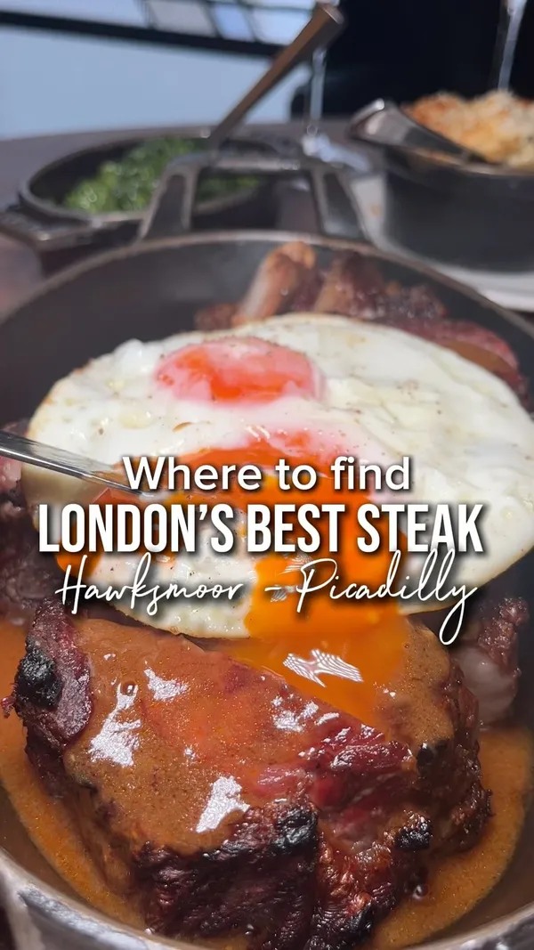 The video showcases a meal at Hawksmoor Restaurant in Piccadilly, London.  The food includes scallops, a ribeye steak with fried eggs and sauce, creamed spinach, mac and cheese, sticky toffee pudding, and peanut butter shortbread.  The presentation is elegant, with a focus on high-quality ingredients and refined plating.  No dietary information is explicitly mentioned. The video primarily focuses on showcasing the food and the restaurant's ambiance.