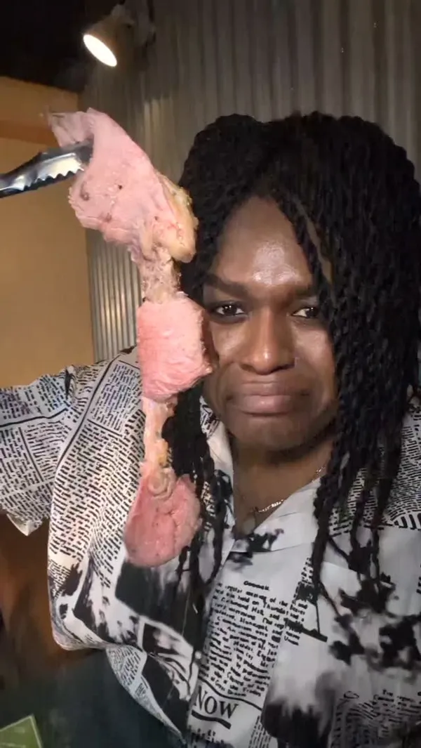 The video showcases Preto, a Brazilian steakhouse Rodizio in Victoria, London, offering an all-you-can-eat experience for £30. The video begins with a shot of grilled meat and then shows the exterior of the restaurant. It then transitions to the buffet-style sides, including carbs and salads. A lime caipirinha is featured before the presenter showcases the freshly grilled meat being served. The video also includes shots of sweet corn, beans, and spicy sausage. The video concludes with dessert options like cheesecake and caramel custard flan. The main focus is on the all-you-can-eat meat and side dishes.