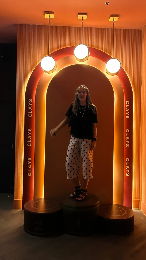 A short, energetic vlog showcasing a visit to Clays in Soho, highlighting the interactive target shooting arcade experience, cocktails, and the competitive social atmosphere.