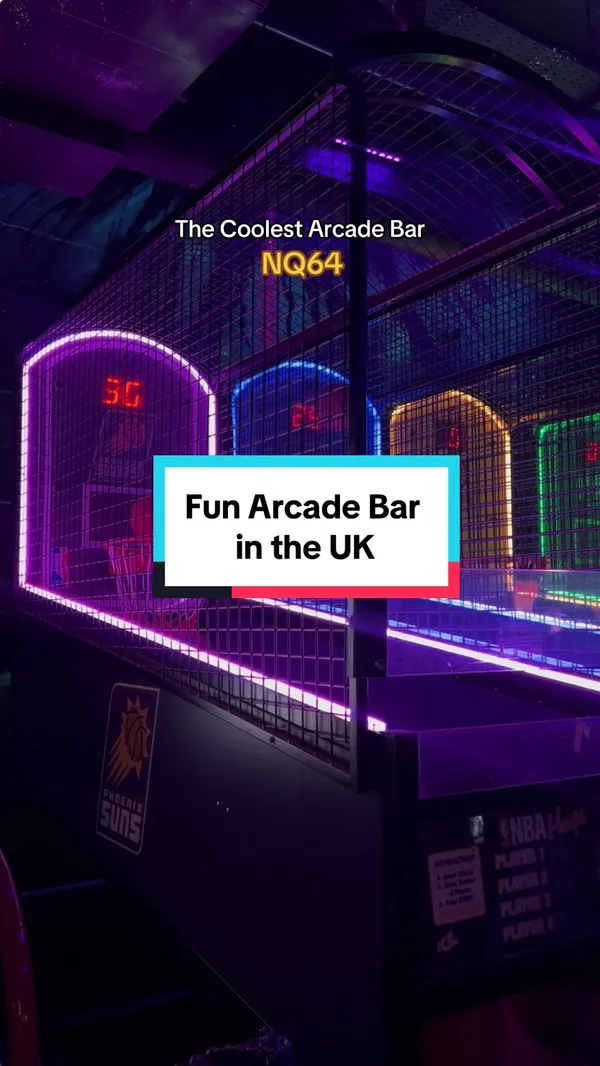 This TikTok video showcases NQ64, an arcade bar with multiple locations in the UK. The video provides a vibrant tour of the bar, highlighting its neon aesthetic, various arcade games (including racing games, dance games, and light gun games), and a cocktail menu. The video focuses on the lively atmosphere and fun activities offered at the arcade bar.  While specific drinks are shown, there's no detailed description of their ingredients or dietary information provided.