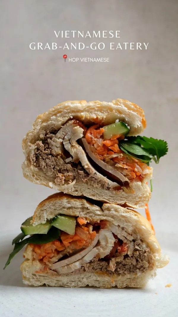 This video showcases various dishes from HOP Vietnamese restaurant's new menu in London. Dishes shown include Lemongrass Pork HOP Box, Beef Brisket Pho, Roast Duck Bánh Mì, Chargrilled Pork Bánh Mì, VFC Dippers, and Pork Ribs.  The video highlights the restaurant's quick-service and digital ordering system.  The video mentions vegetarian and vegan options are available but doesn't visually showcase them.