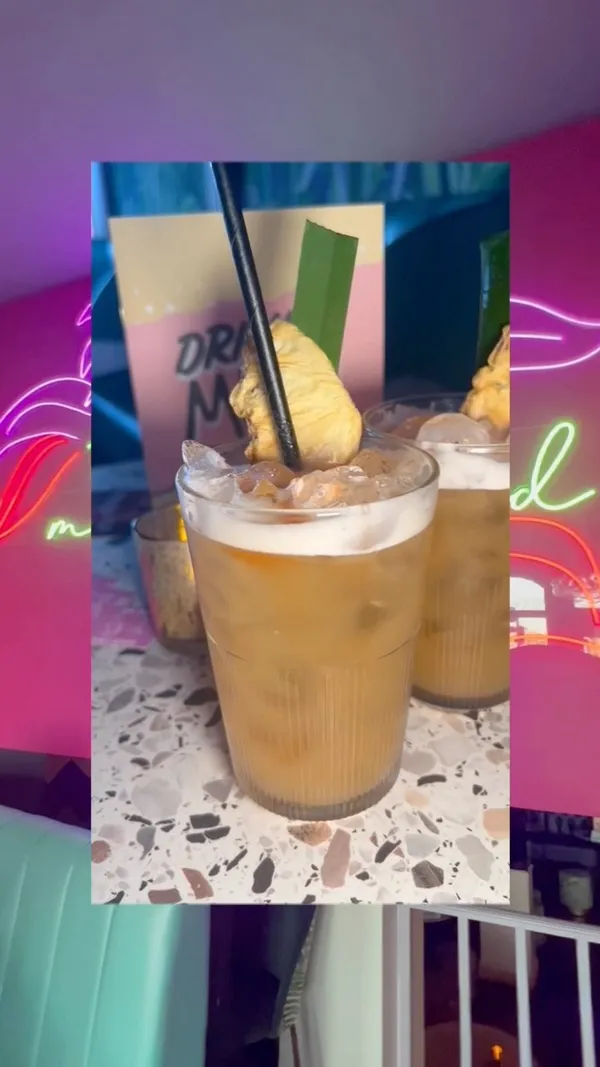 This video showcases Tequila Mockingbird, a bar in Putney, London.  The video features various shots of the bar's interior, including the upstairs and downstairs areas, as well as an outdoor space. It highlights the bar's vibrant decor and ambiance, particularly focusing on neon signs and pink and purple colour schemes. Several cocktails are shown, including a pink raspberry-looking cocktail. The main focus is on the atmosphere and experience of visiting Tequila Mockingbird, rather than a detailed food/drink showcase.