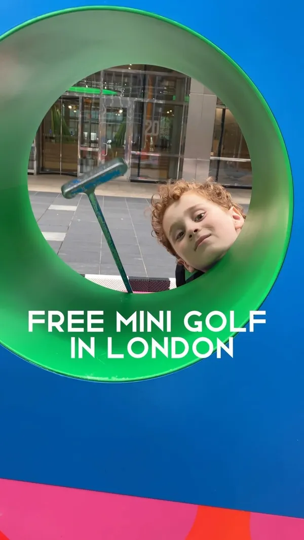 The video showcases free mini golf in Canary Wharf, London. It features children and adults playing the course, which has a colorful and playful design.  The video highlights the course's fun atmosphere and ease of access.  A brief shot shows a box of golf balls, and the video concludes with a mention and tag for "@smashingplatesuk", suggesting it's a nearby restaurant or eatery.