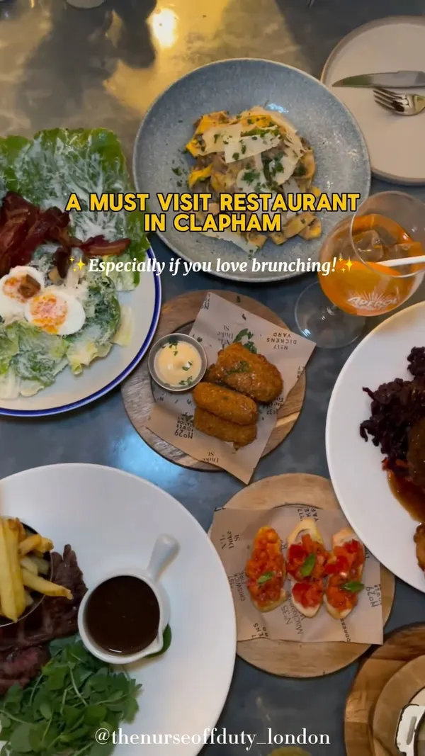 The video showcases No 32 The Old Town, a restaurant in Clapham, London. It features a variety of food and drinks, including brunch items, Sunday roasts (meat and vegetarian options), pasta dishes, appetizers, and cocktails. The presentation focuses on visually appealing close-ups and overhead shots of the dishes, highlighting their textures, colors, and plating.  Dietary options include vegan and dairy-free choices. The video's main focus is a delicious meal showcase, highlighting the restaurant's ambiance and food offerings.