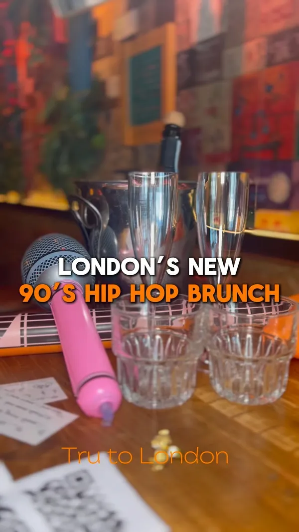 The video showcases Barrio, a bar in Angel, Islington, London, promoting their new 90s hip hop themed bottomless brunch.  The brunch includes 90 minutes of bottomless prosecco, beer, and cocktails, along with sharing portions of nachos and tacos.  The video features vibrant visuals of the food and drinks, the venue's atmosphere, and people enjoying the brunch.  The presentation is lively and emphasizes the fun, social aspect of the event.  No specific dietary information is provided.
