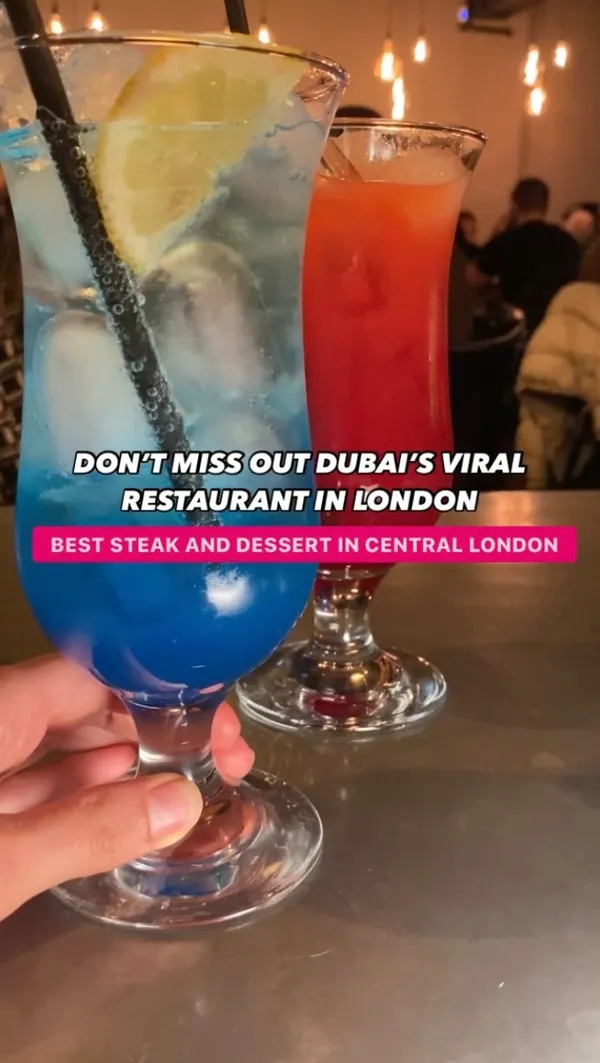 This video showcases Swiss Butter, a Dubai restaurant in London. It highlights their halal steak and desserts, emphasizing a signature sauce. The video shows various dishes, including salmon and chicken steak with the sauce, along with fries, baked potatoes, salad, and two desserts.  Dietary information includes that the food is halal. The main focus is showcasing the food and drinks.