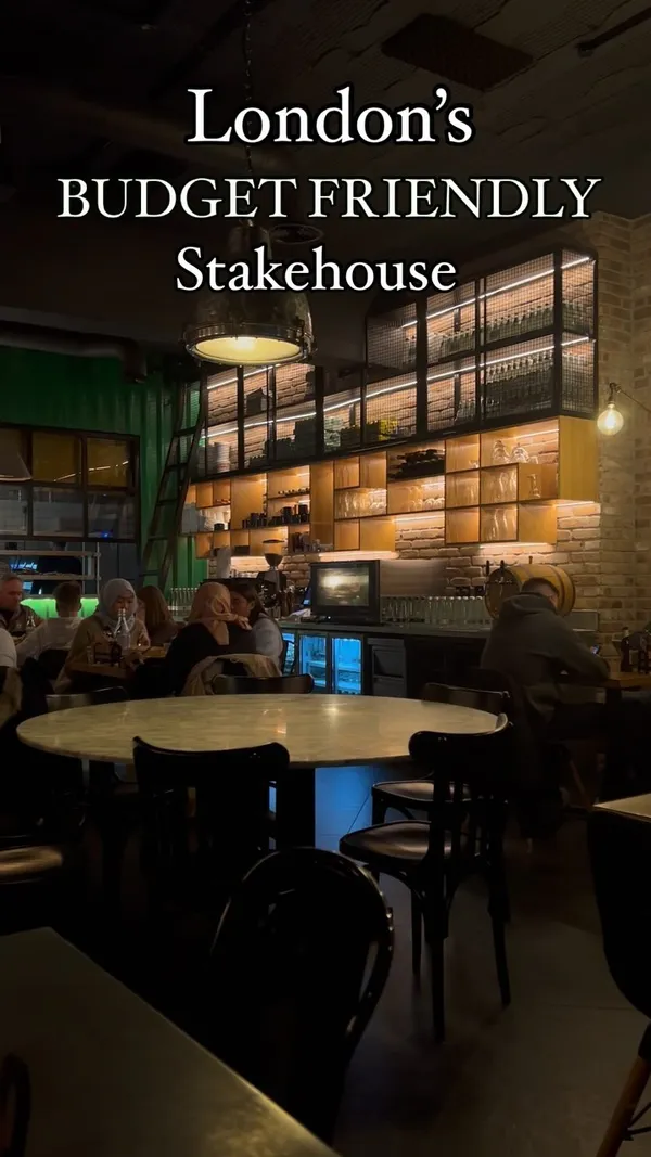 This video showcases Swiss Butter, a steakhouse in Holborn, London, known for its budget-friendly menu.  The video highlights three main dishes: chicken, beef fillet/ribeye, and salmon, all served with a signature butter sauce, fries (optional), salad, and bread.  Desserts, including pain perdu and molten chocolate cake, are also featured. The video emphasizes the £19 price point for the main courses and showcases the food's presentation in detail, including overhead shots of the plates.  The atmosphere of the restaurant is briefly shown at the start and end of the video. No specific dietary information is provided.