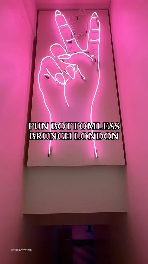 The video showcases a lively, neon-lit bar scene in London, specifically at the Josephine Sassaoke event. It features various cocktails being prepared and served, including champagne, mixed drinks, and shots.  The presentation focuses on the colorful ambiance and the social atmosphere. Patrons are seen singing karaoke, dancing, and enjoying the bottomless brunch.  No specific dietary information is provided.
