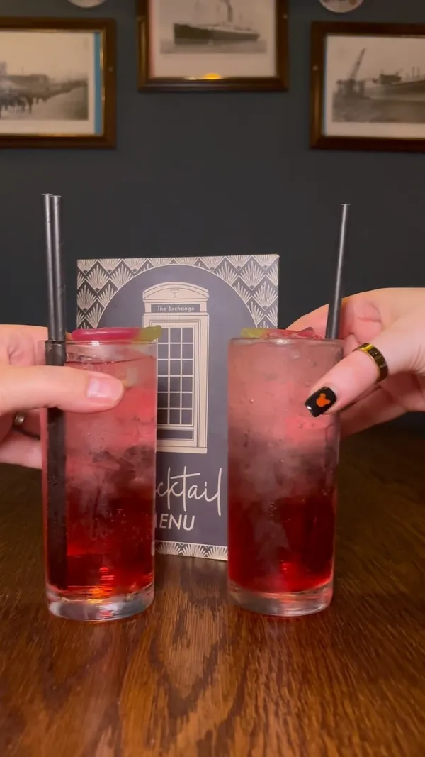 This video showcases a Newcastle Cocktail Week crawl, visiting four different bars. Each bar features unique cocktails, shown being prepared and enjoyed. The video highlights the ambiance of each venue, including the decor, lighting, and overall atmosphere.  The cocktails are presented visually appealingly, and the overall tone is enthusiastic and positive.