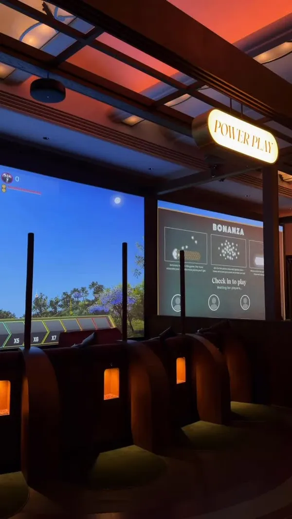 The video features a creator visiting Clays Bar in London, highlighting the virtual clay target shooting activity, the bar area, and the drinks served. It uses quick cuts and upbeat music to convey a fun, social atmosphere suitable for groups or dates.
