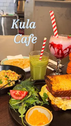 Alt text: "Iced oat matcha and French toast with berries at Kula Cafe, a halal brunch spot near Selfridges, London.