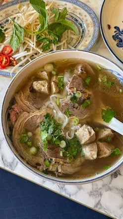 'Delicious Vietnamese dishes at Wow Bánh Mì in Ancoats, featuring bánh cuốn and flavorful phở, perfect for food lovers.'