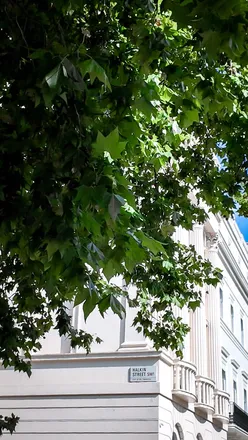 Luxury suite at COMO The Halkin with elegant decor, butler service, and access to a private garden in Belgravia.