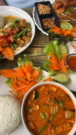 Delicious Thai dishes at Paphada's in Sheffield, featuring vegan options like Spring Rolls and Red Curry.