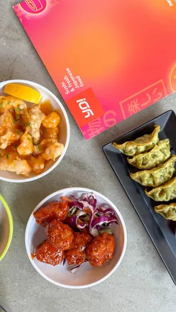 Enjoying sushi rolls and Korean fried chicken at YO! Sushi, West George Street, after a cinema visit.