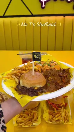 Delicious burgers and Kunafa flurry enjoyed at the vibrant @mr__ts in Sheffield, showcasing a modern and artistic ambiance.