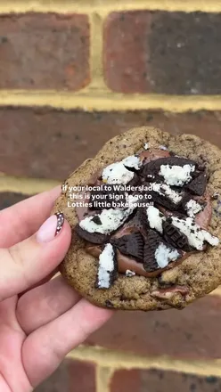 Excited shoppers enjoying freshly baked cupcakes at a new bakery in Walderslade, Kent.