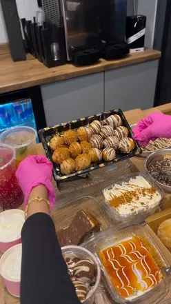 Indulgent desserts at Bonbons in East London, featuring cookie dough, cheesecakes, and refreshing mocktails.