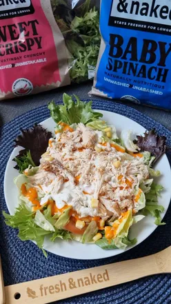 Fresh salad with crisp leaves and baby spinach at Fresh and Naked, promoting healthy eating in Sheffield.