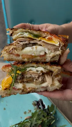 Delicious new breakfast items at Carlisi Dale Street, featuring scrambled eggs on focaccia sandwiches.