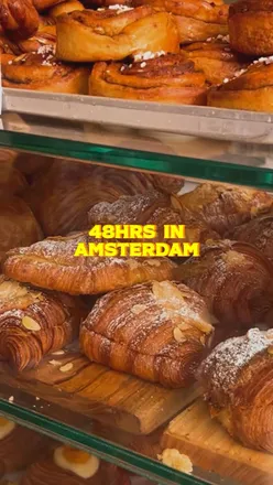 Exploring Amsterdam: pistachio cruffins, vegan sushi, and stroopwafels on a scenic boat tour.