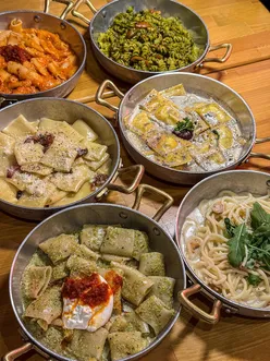 Delicious pasta, aubergine balls, and dark chocolate cake at 100% Pasta in Gloucester Green, Oxford.