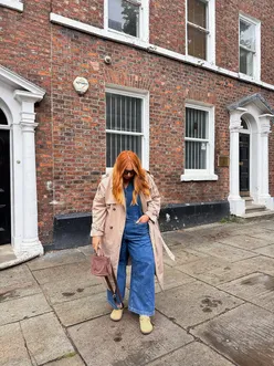 Cozy autumn moments in Manchester with coffee, foliage, and warmth, capturing life's little joys.