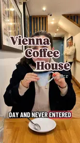 Cozy autumn scene with a Fiaker coffee at Vienna Coffee, perfect for chilly days in Manchester.