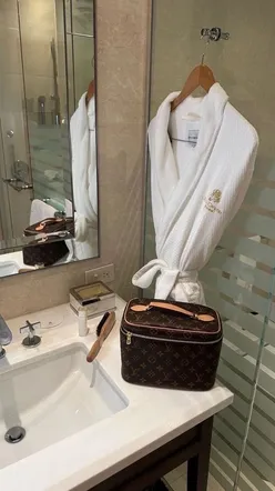 Aesthetic restroom design in a Manchester restaurant with stylish decor and vibrant colors.