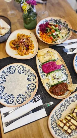 Delicious Turkish mixed mezze and grilled halloumi at Mezza restaurant in Nottingham, perfect for food lovers.