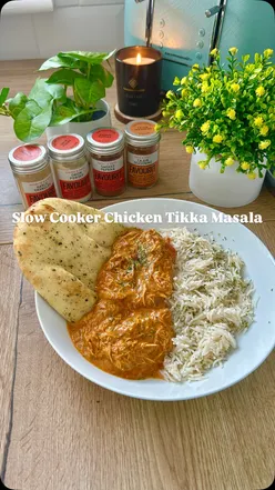 Slow Cooker Chicken Tikka Masala made with Favourit spices, served with basmati rice and naan bread.