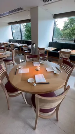 'Guests enjoying sushi and signature dishes at Nobu Old Park Lane, blending Japanese and Peruvian cuisine.'