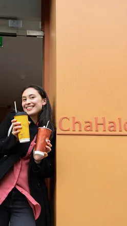 Enjoying pure milk teas at Chahalo in Edinburgh, featuring fresh brews and unique flavors at their grand opening.