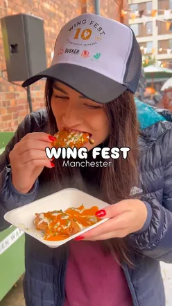 Delicious chicken wings from various traders at Wing Fest in Manchester, celebrating flavors and food fun!