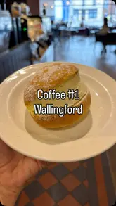 Enjoying a Pumpkin Spice Latte and Pistachio Crème Cake at Coffee #1 in Wallingford, perfect for autumn vibes.