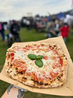 Elsie’s Pizza at Costessey Fete, featuring margherita and BBQ chicken stone-baked pizzas.