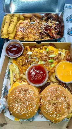 Delicious munch box featuring deluxe burgers, wings, and loaded fries at Kitchen Kings in Blackwood, Wales.
