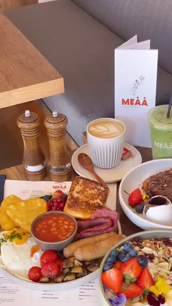 Brunch lovers enjoying delicious dishes at MEAA, the new hot spot in Birmingham for unforgettable dining experiences.