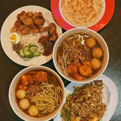 Delicious Malaysian dishes at Fatrice pop-up on Glassboat in Bristol, featuring prawn mee, nasi lemak, and char kuey teow.