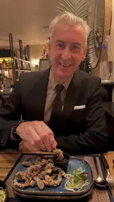 Ewelina and Jonathan enjoying authentic Thai dishes at Nusara, Westbourne, Dorset, a vibrant culinary experience.