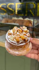 Delicious pastries, breakfast dishes, and sandwiches at top Liverpool food spots: Suburbs Patisserie, Derek's, Press Bros Coffee.