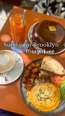 Delicious Sunday pancakes with hazelnut praline and cheddar scramble with salmon at Sunday in Brooklyn, London.